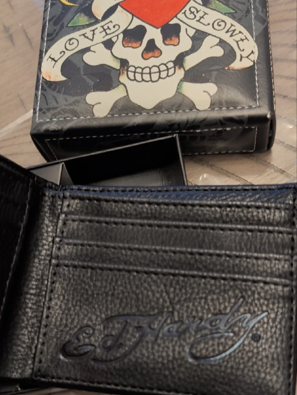 Ed Hardy Black Men’s Bifold Wallet with Silver Logo Accent